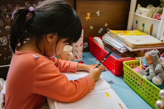 Child working on workbook